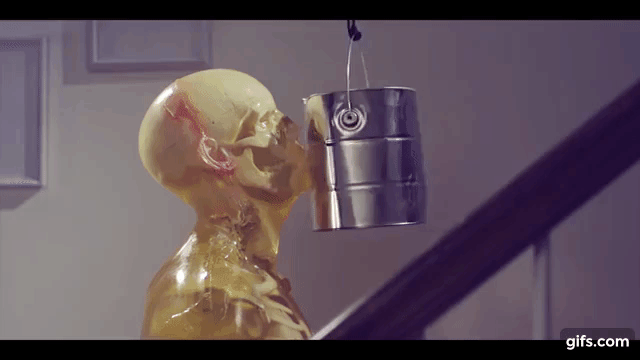 Gif image of slo-mo video showing a paint can smashing into an anatomical model of a human face, forever Gif image of slo-mo video showing a paint can smashing into an anatomical model of a human face, forever