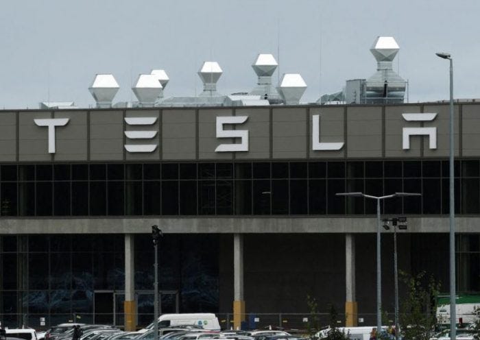 A general view shows the Tesla logo on the Gigafactory in Gruenheide near Berlin, Germany, August 30, 2022. REUTERS/Annegret Hilse/File Photo