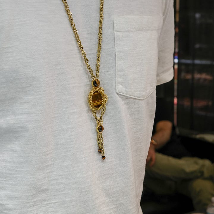 Piaget 'swinging sautoir' with tiger's eye dial; Patek Philippe 2526G white gold