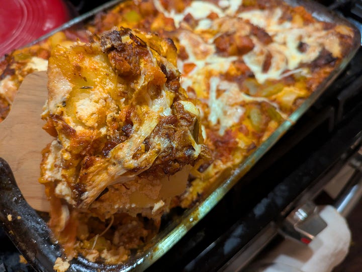 Finished, browned lasagna, and in the oven before browning top layer.