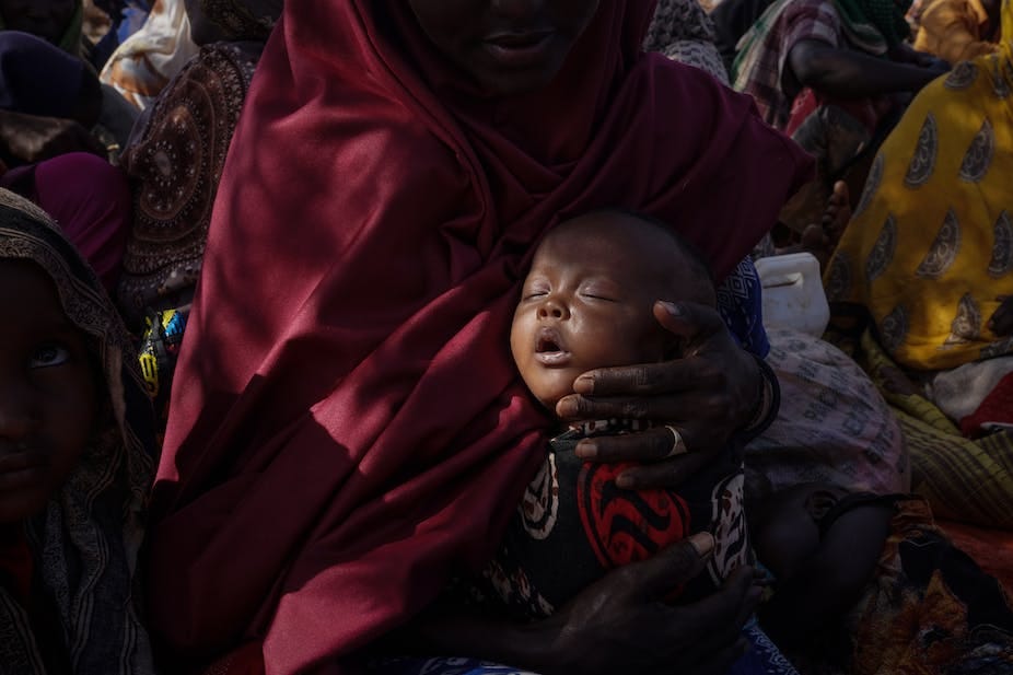 Baby in mother's arms Baby in mother's arms
