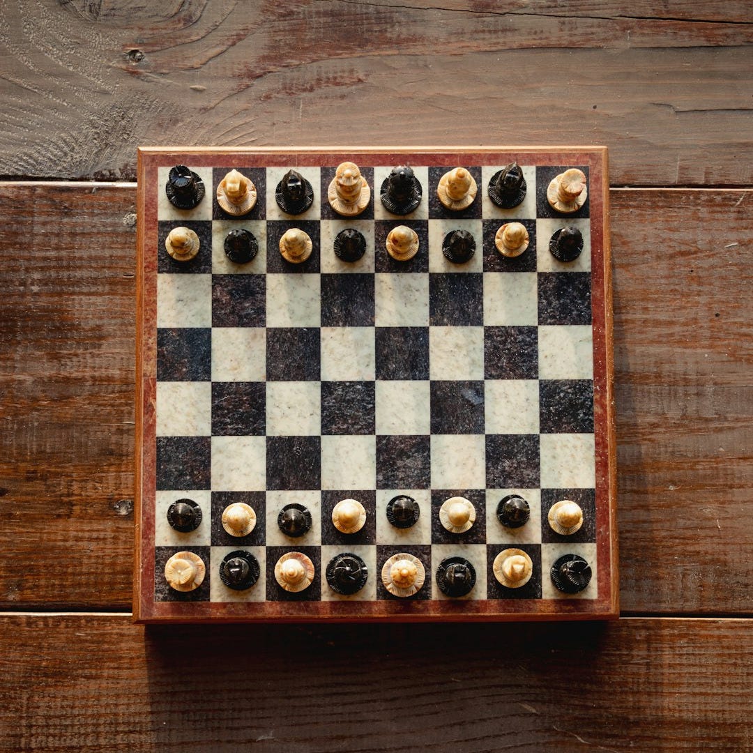 brown and white chess board game brown and white chess board game