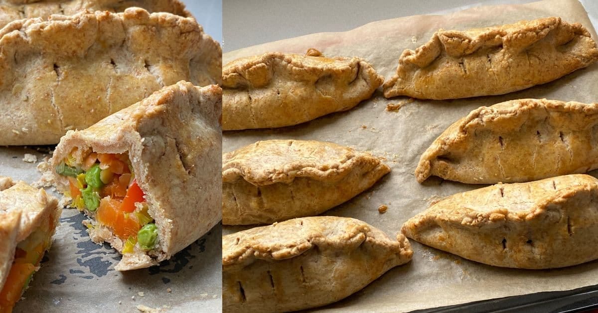 Baked Vegetable and Lentil Pasties on a baking tray. Baked Vegetable and Lentil Pasties on a baking tray.