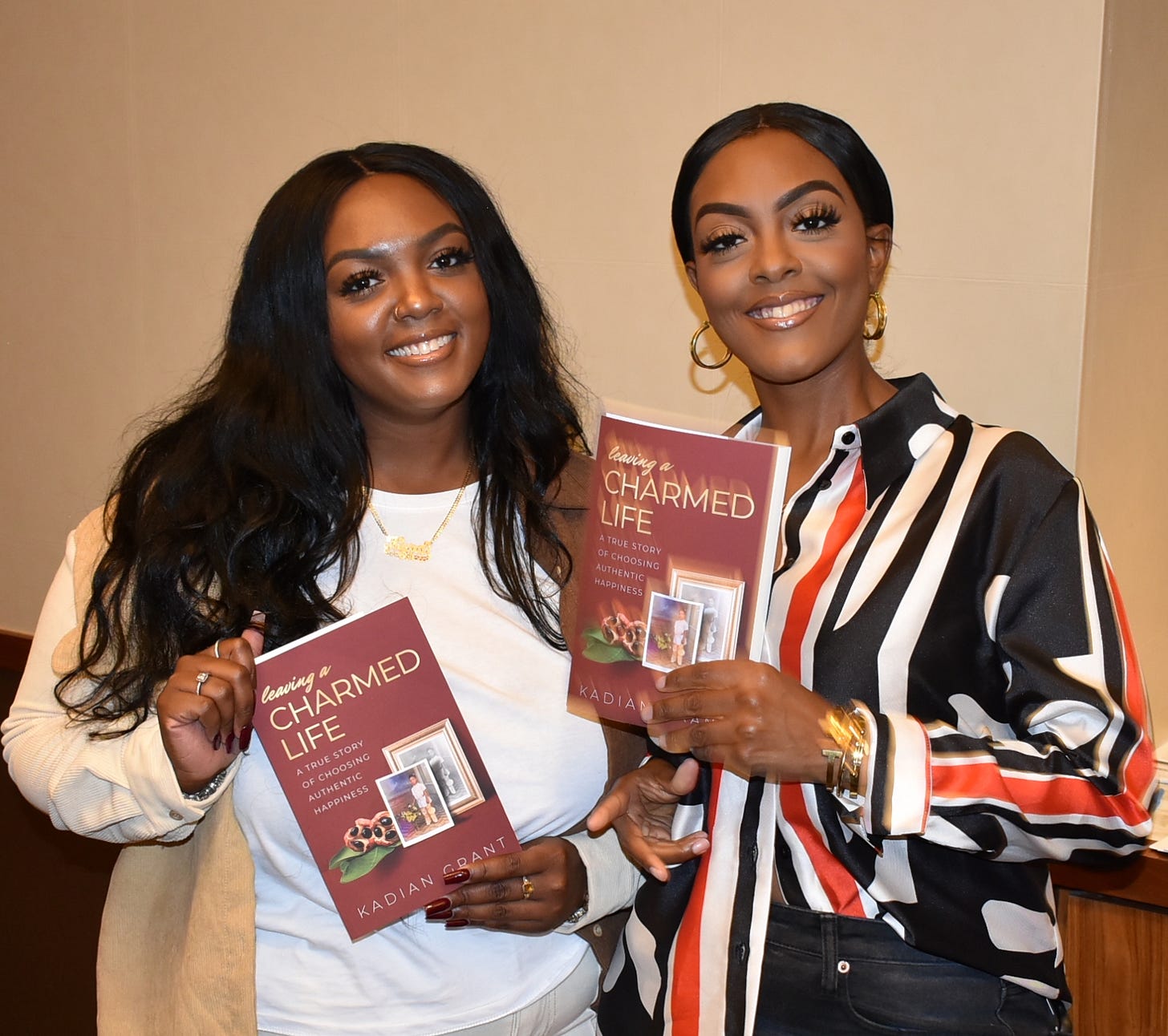 Kadian's beautiful daughters, Kyra and Kamilah, holding their mother's book. Kadian's beautiful daughters, Kyra and Kamilah, holding their mother's book.