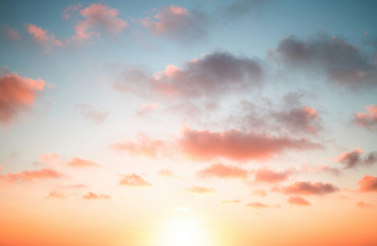 A sunset with the camera pointed up at the sky. 