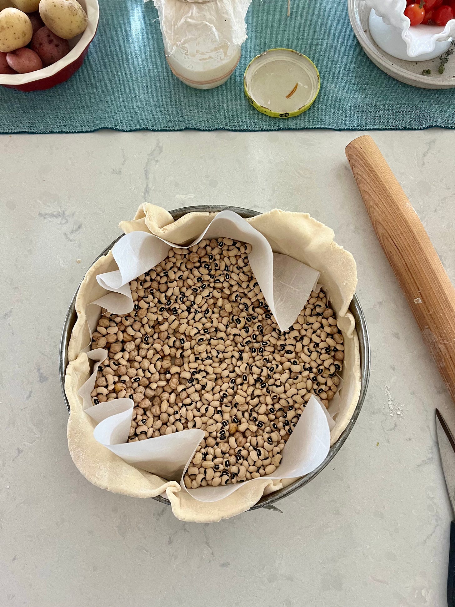 Pre-Baked Sourdough Crust with dry beans inside
