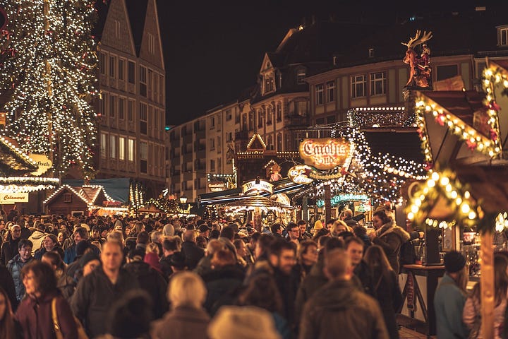 Raclette cheese and a crowded market