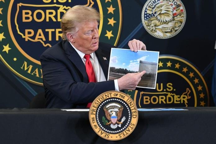 A person holding a picture
Description automatically generated A person holding a picture
Description automatically generated
