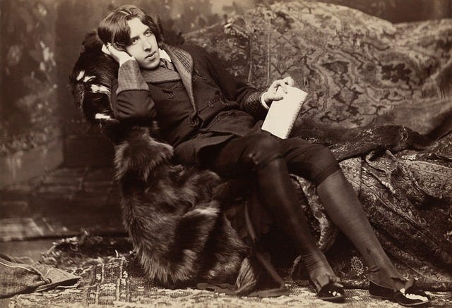 sepia photo of Oscar Wilde reclining on a divan sepia photo of Oscar Wilde reclining on a divan