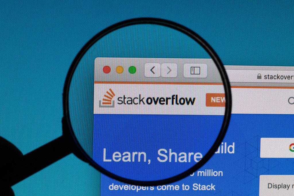 Stack Overflow logo under magnifying glass Stack Overflow logo under magnifying glass
