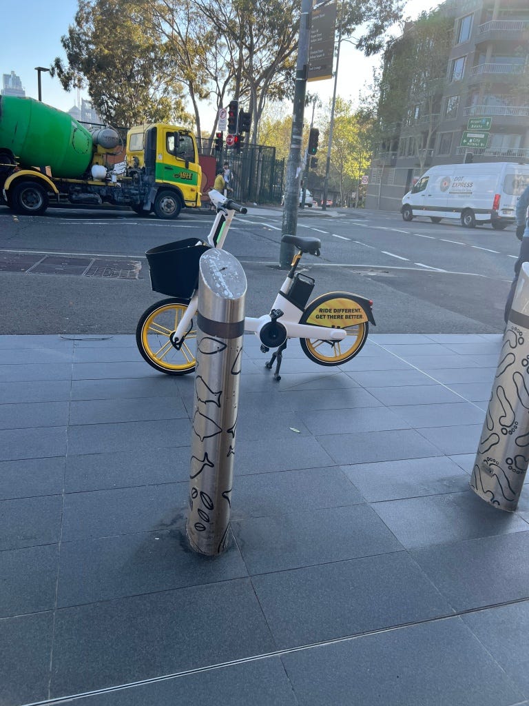 At Redfern Station, in front of the entrance.