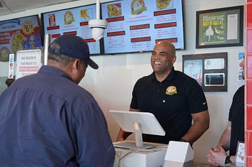 Colin taking an order