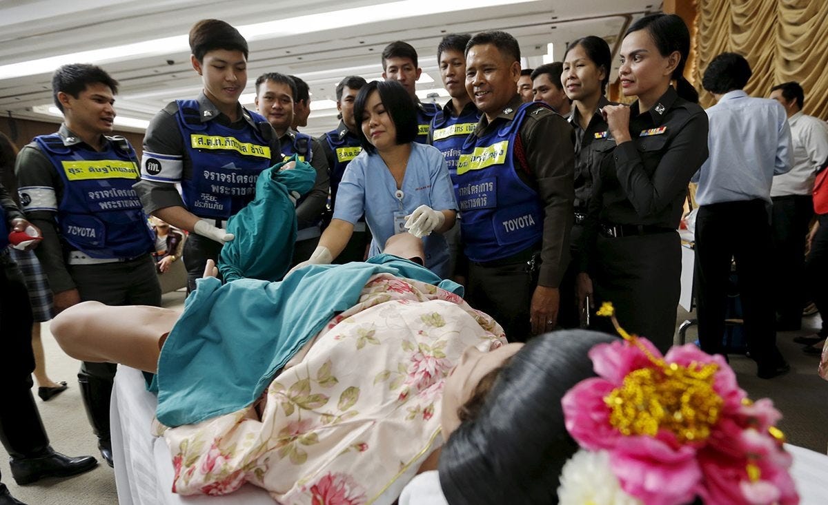 New motorcycle midwives train to help deliver a baby, in 2015. 