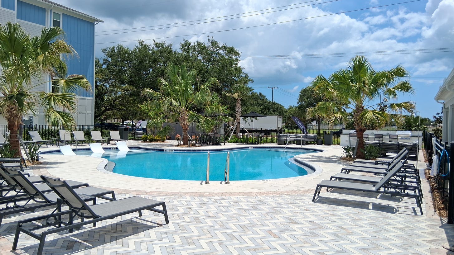 Pool area at Madison Midtown Apartments, Melbourne, Florida