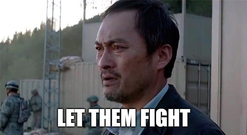 Screenshot from Godzilla (2014) with actor Ken Watanabe saying 'Let them fight'
