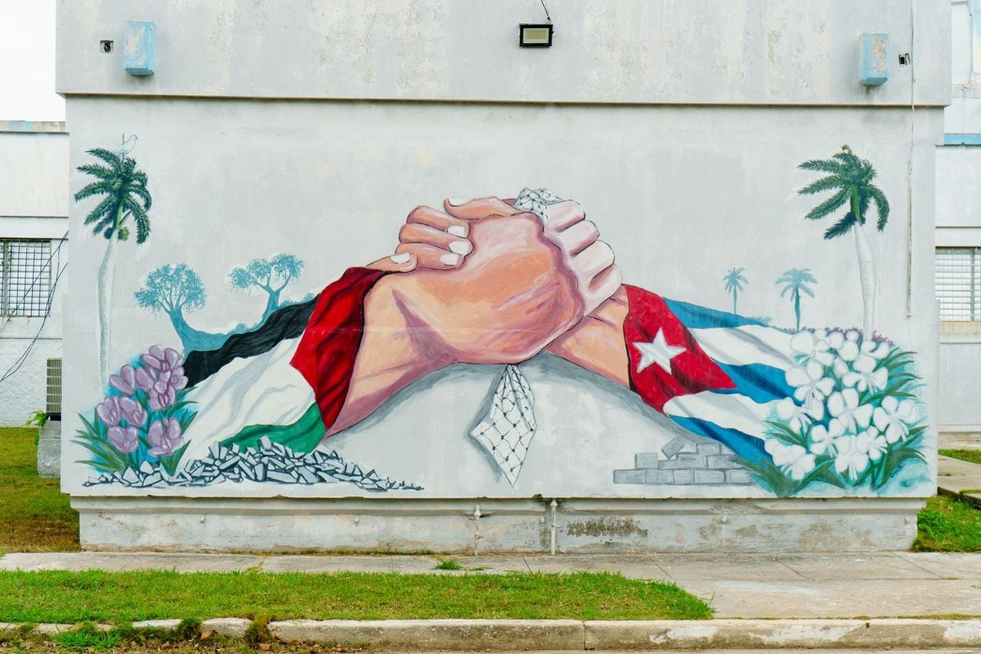 A mural of hands shaking
AI-generated content may be incorrect. A mural of hands shaking
AI-generated content may be incorrect.