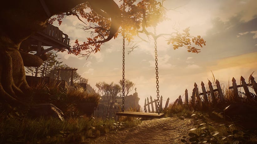 A swingset hangs from an old tree A swingset hangs from an old tree