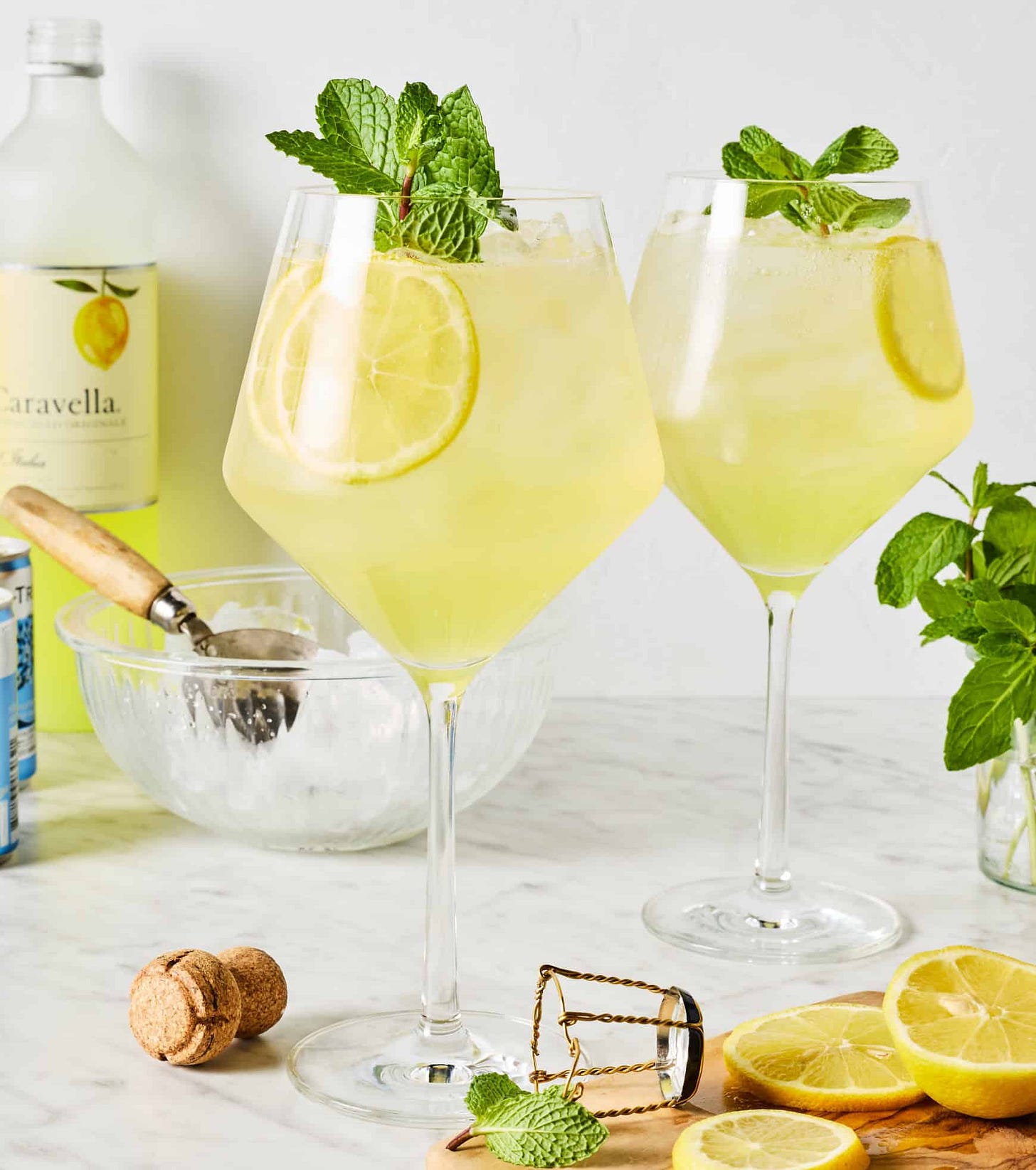 Limoncello spritz garnished with mint and lemon slices Limoncello spritz garnished with mint and lemon slices