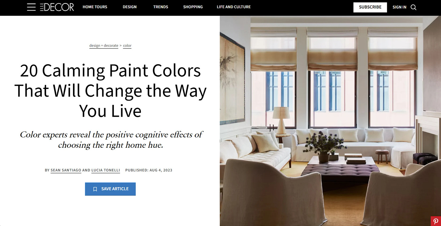 A stylish living room with neutral tones showcasing an article about calming paint colors for home interiors.