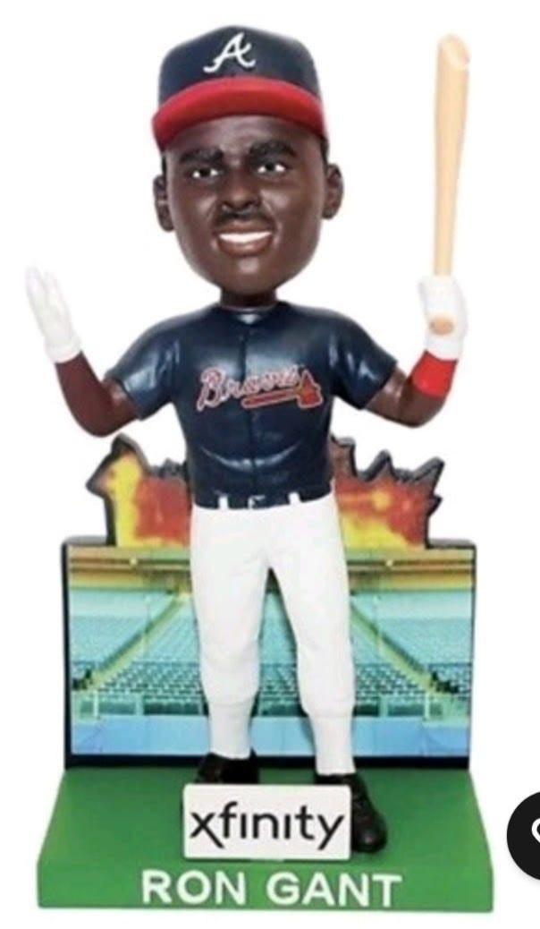 Ron Gant bobblehead with the stadium fire shown behind him.