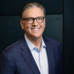 Brian T. Olsavsky Senior Vice President and Chief Financial Officer Headshot