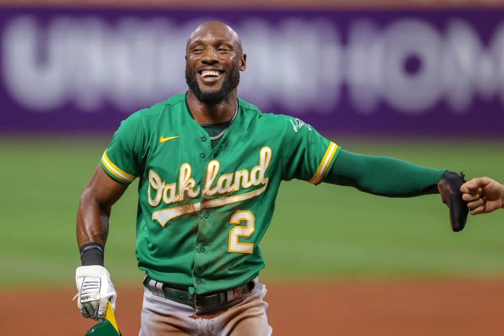 CLEVELAND, OH - AUGUST 10: Oakland Athletics center fielder Starling Marte (2) reacts after diving back to third base during the eighth inning of the Major League Baseball game between the Oakland Athletics and Cleveland Indians on August 10, 2021, at Progressive Field in Cleveland, OH. (Photo by Frank Jansky/Icon Sportswire via Getty Images)