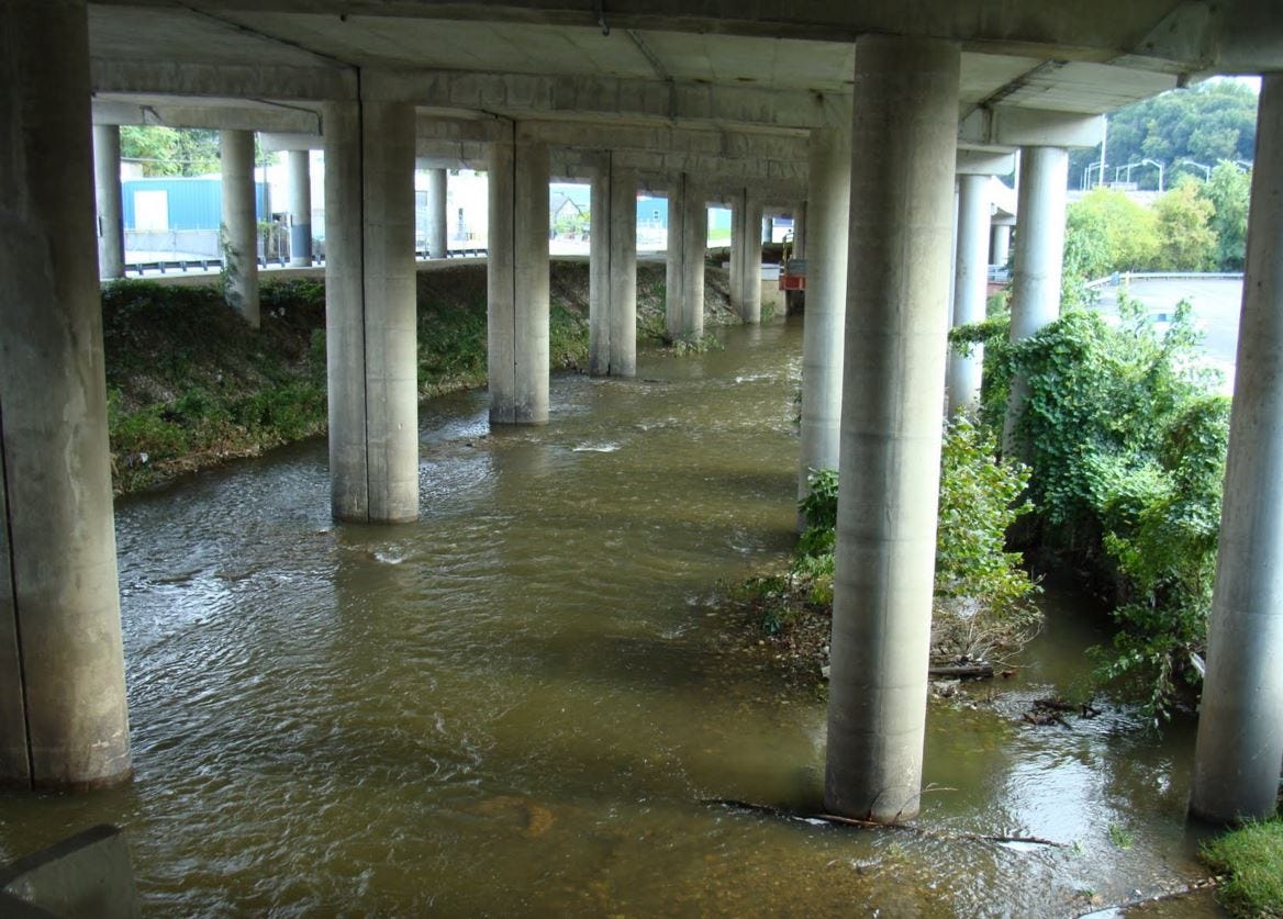 Photo of an elevated highway over a stream Photo of an elevated highway over a stream