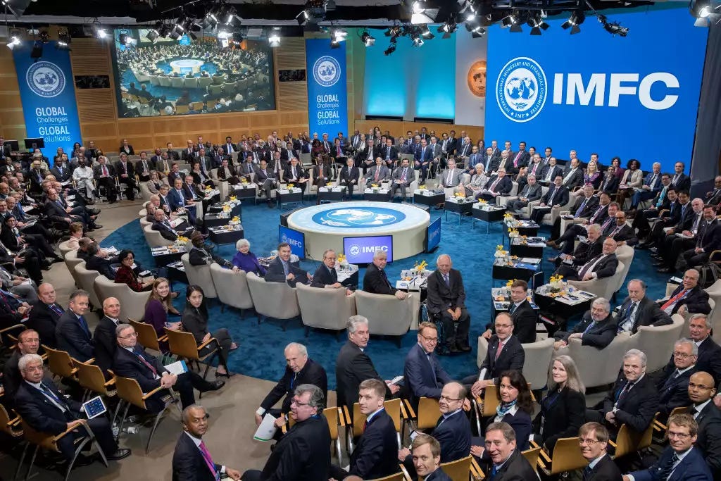 IMF members pose for a photograph April 22, 2017 at the IMF Headquarters in Washington, DC. IMF members pose for a photograph April 22, 2017 at the IMF Headquarters in Washington, DC.