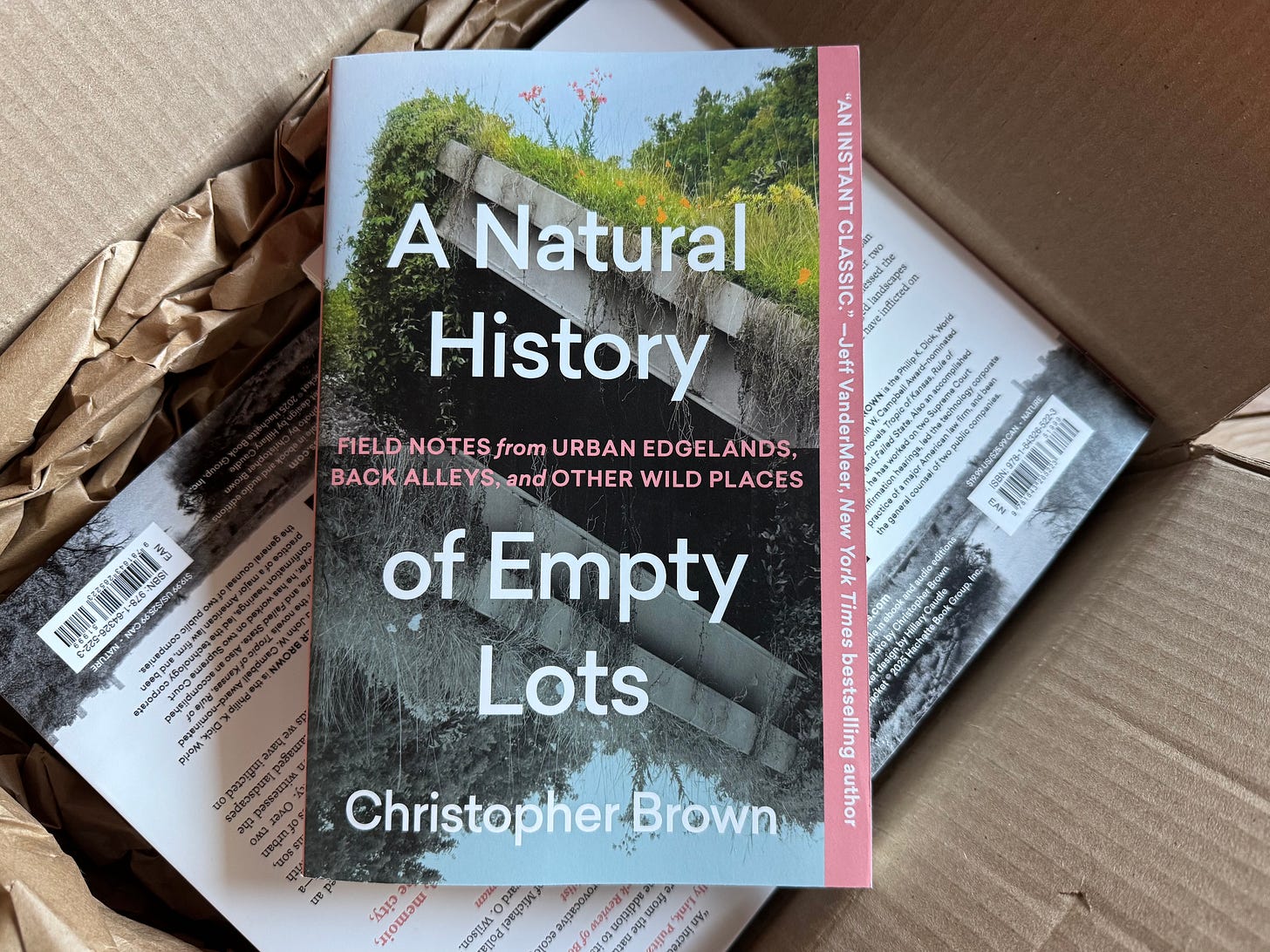 Paperback copy of A Natural History of Empty Lots