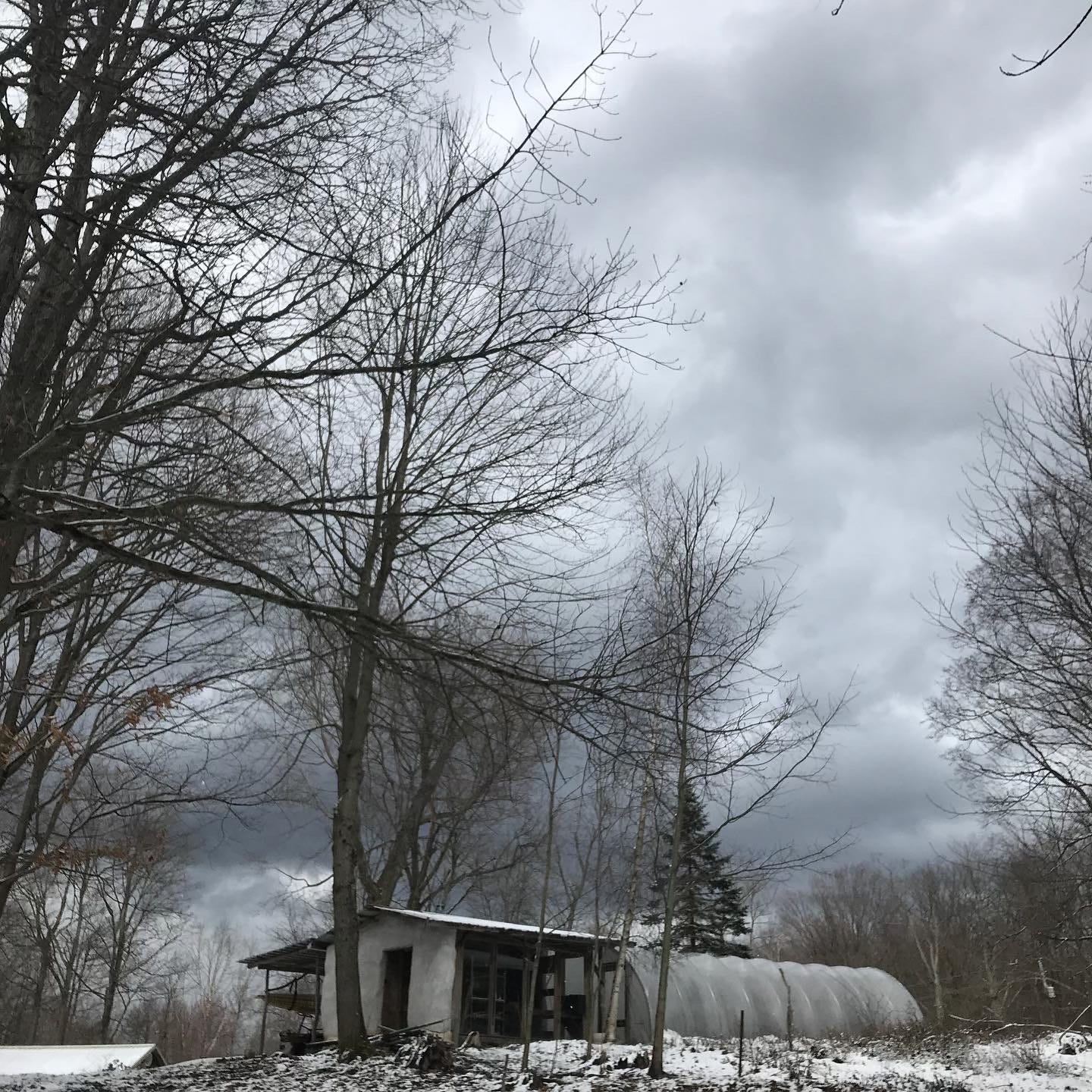 Dark wintry clouds behind the writer's studio.