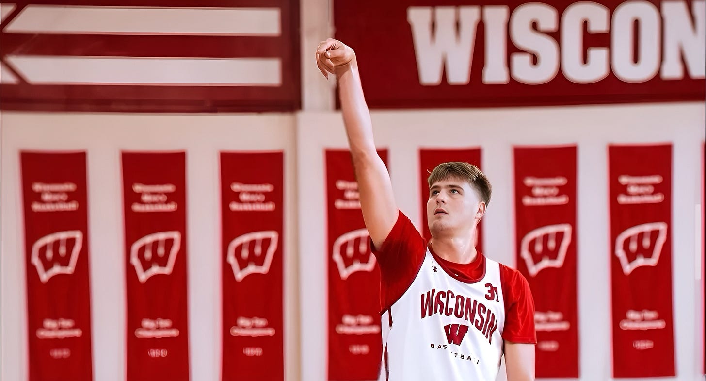 Wisconsin Badgers forward Nolan Winter practices his shooting inside the Nicholas Johnson Pavilion. Wisconsin Badgers forward Nolan Winter practices his shooting inside the Nicholas Johnson Pavilion.