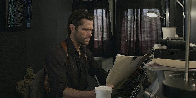 Walker Jared Padalecki reading police file on Geri at Northside Nation. Walker Jared Padalecki reading police file on Geri at Northside Nation.