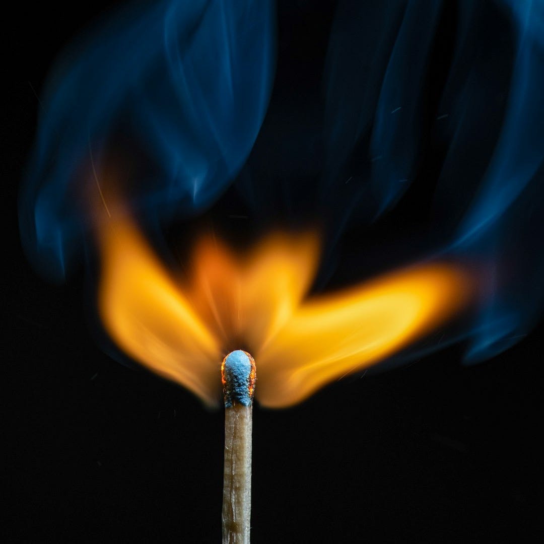 lighted match lighted match