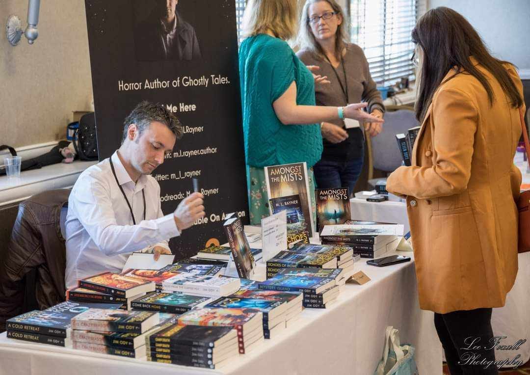 Author M L Rayner signs a book for a reader at last year’s event