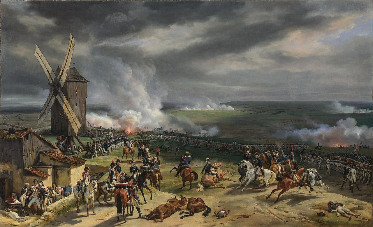 A painting of the Battle of Valmy. In it, the fire of cannon and muskets can clearly be seen. A painting of the Battle of Valmy. In it, the fire of cannon and muskets can clearly be seen.