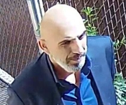 NYPD released a photo of a burglar posing as a visiting priest who robbed another priest of nearly $1,000 at a Queens church. (NYPD) NYPD released a photo of a burglar posing as a visiting priest who robbed another priest of nearly $1,000 at a Queens church. (NYPD)