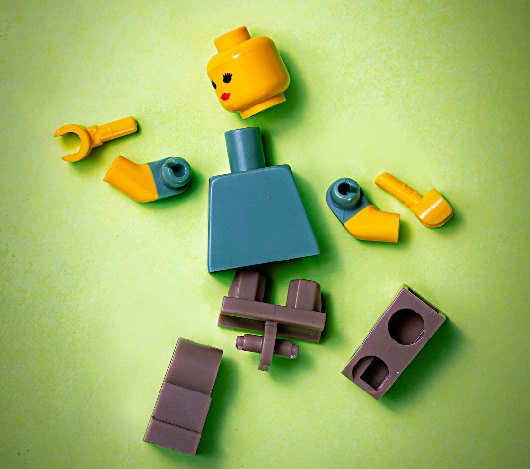 blue orange green and yellow plastic toy