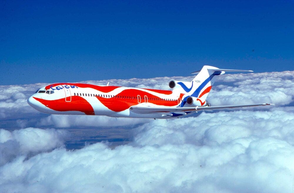 Photo of a Braniff 727 airline in an Alexander Calder-designed paint scheme.