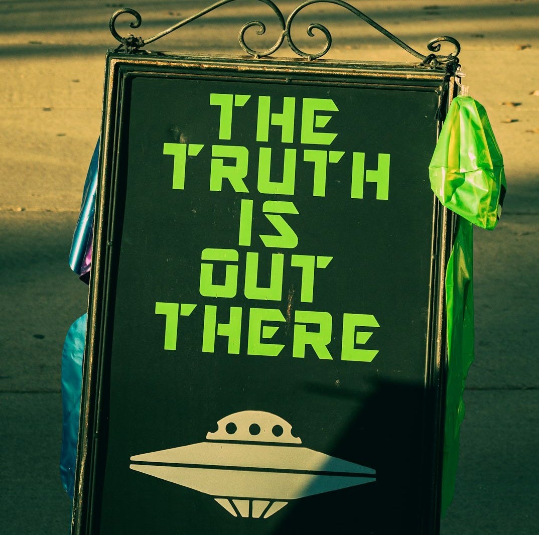 a sign that says the truth is out there
