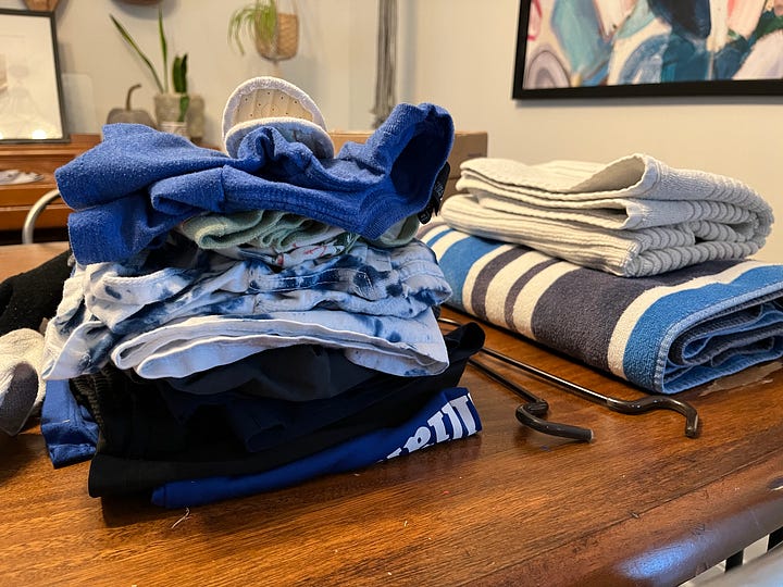 The piles around my house on once particular afternoon: laundry, library books, lunchboxes, dishes.