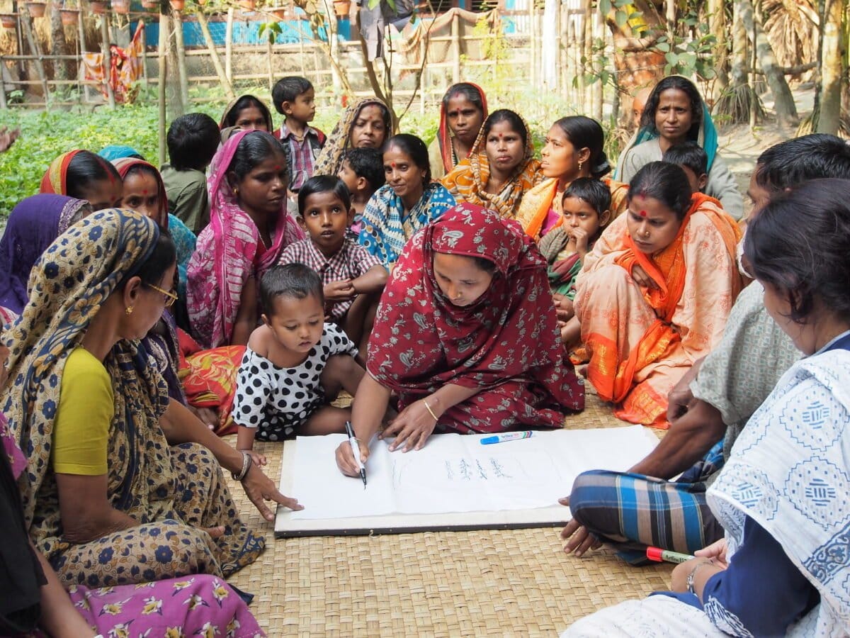 Participatory Rural Appraisal (PRA) mapping exercise with the community in Jagannathpur village, Jhalokhati, Bangladesh. Photo by Sarah Castine / WorldFish