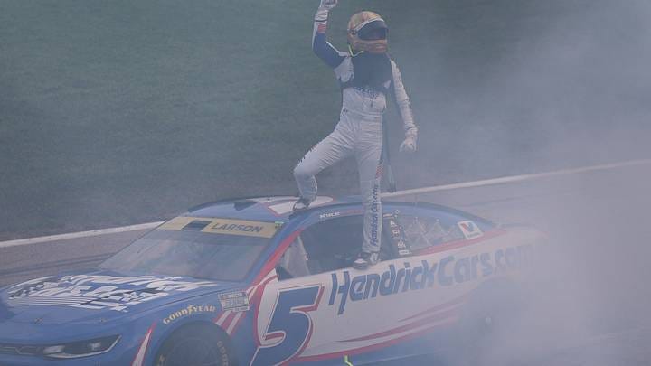 Kyle Larson celebrates following a dominant win in the NASCAR Cup Series Hollywood Casino 400 at Kansas Speedway. Kyle Larson celebrates following a dominant win in the NASCAR Cup Series Hollywood Casino 400 at Kansas Speedway.