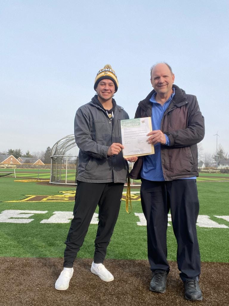 Mason Decker of T3 Warhawks and WRCL League President John Mengelkamp gathers for a photo after Mengelkamp presented Decker with the NABF Scholarship.