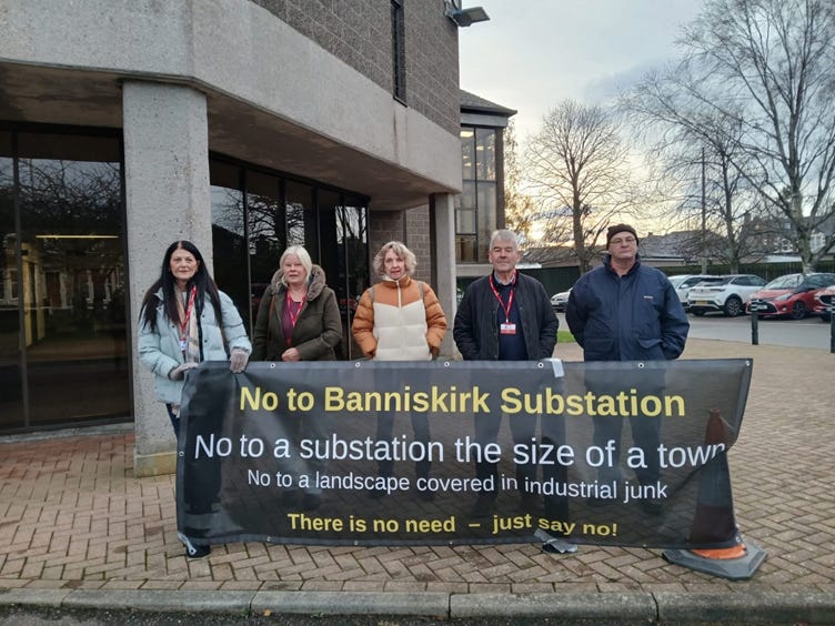 A group of people standing in front of a building holding a banner
AI-generated content may be incorrect. A group of people standing in front of a building holding a banner
AI-generated content may be incorrect.