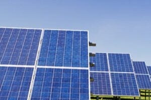 Solar panels in a grassy field | Caltech