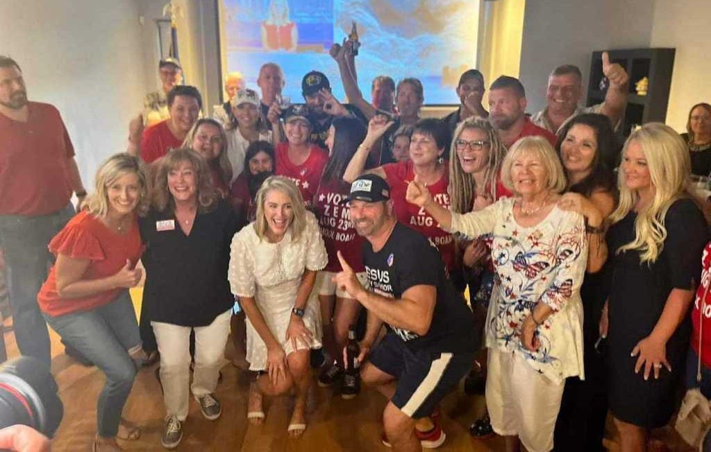 The school board candidates and their supporters celebrate their victory (Facebook/Sarasota Watchdogs)
