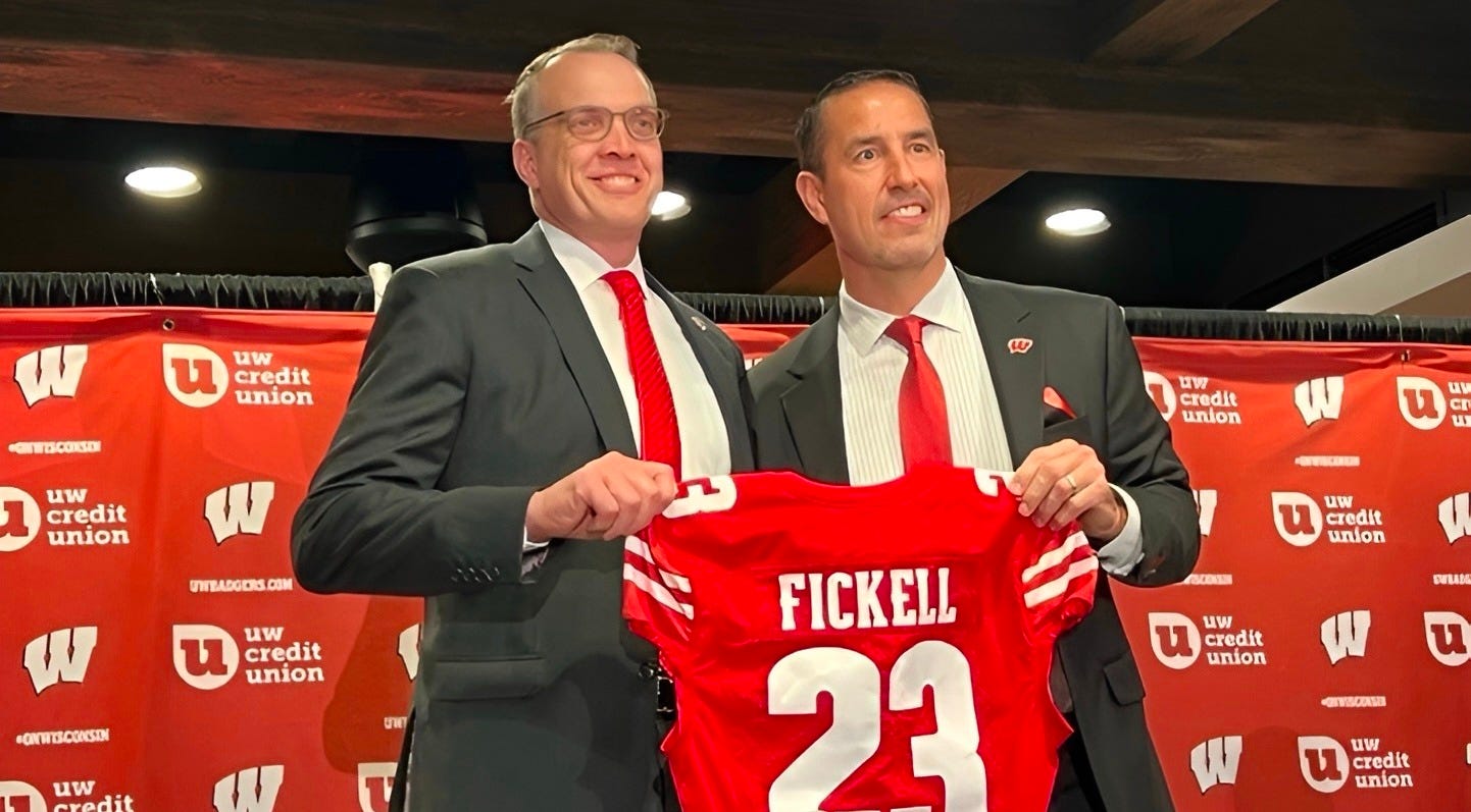 Wisconsin Badgers head football coach Luke Fickell, right, is shown with athletic director Chris McIntosh. Wisconsin Badgers head football coach Luke Fickell, right, is shown with athletic director Chris McIntosh.