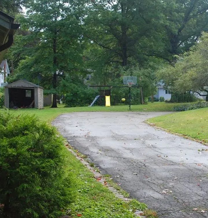 Before photos of the shed: In 2013 with the old driveway, and ten years later with gardens around it in September 2023.