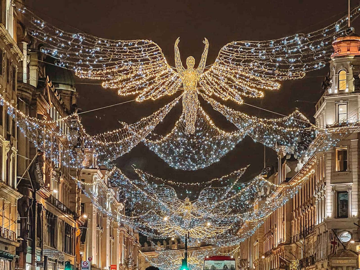 A street with lights and angels

Description automatically generated