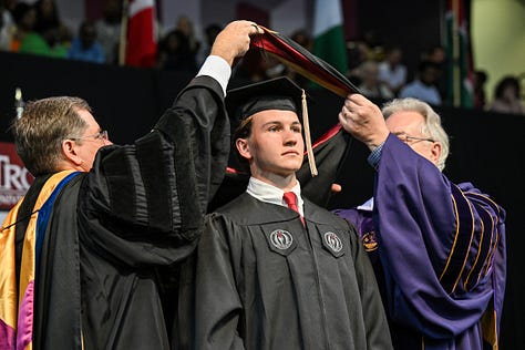 Various photos of graduates at Troy University's commencement ceremony.